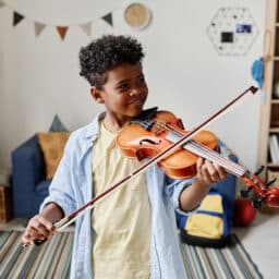 Boy plays violin