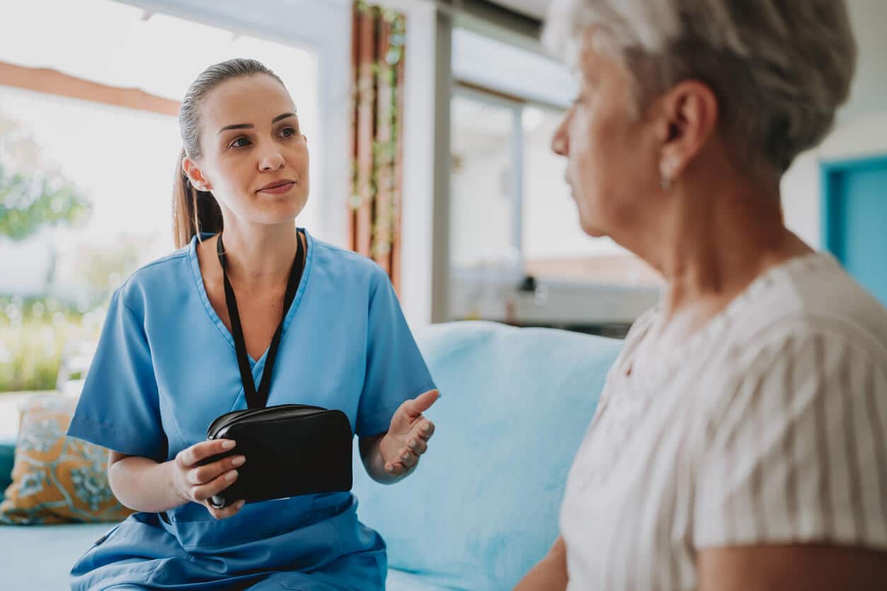 Senior woman seeking audiology care.