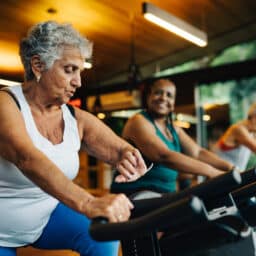 Group of women at a spin class at their local gymnasium