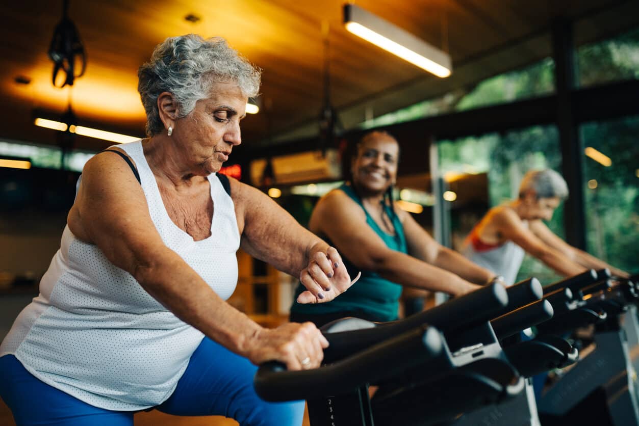 Group of women at a spin class at their local gymnasium
